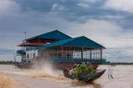 Racing by school / Experiences when travelling through villages in Cambodia