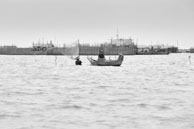 Standing fishing in the lake / Experiences when travelling through villages in Cambodia