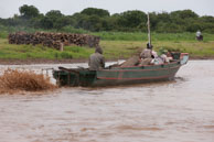 Transporting along the river / Experiences when travelling through villages in Cambodia