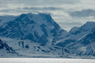 Peak in the Clouds / Tops of the peaks in the clounds at Samarinvågen / Brepollen, Svalbard