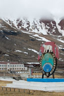 Pyramiden settlement sign / Pyramiden, an abandoned Russian mining settlement
